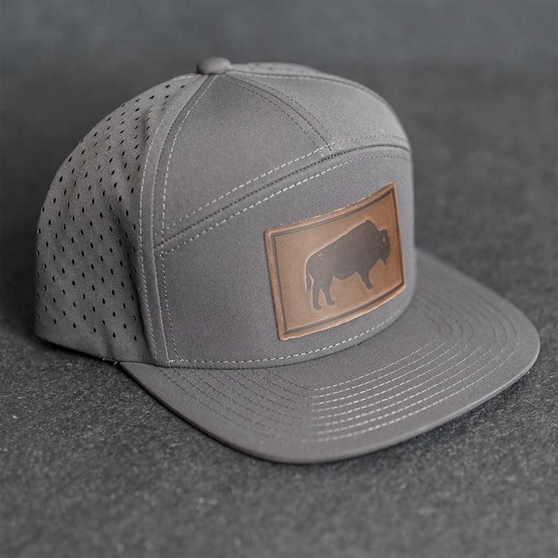 Leather Patch Flat Bill 7 Panel Perforated Performance Hat - Bison Stamp