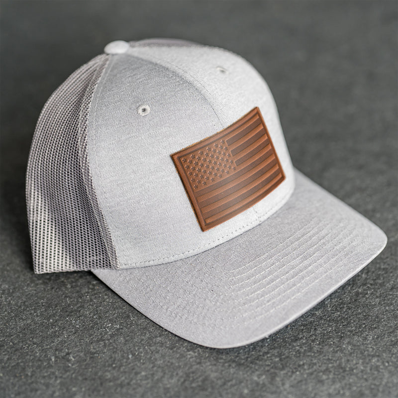 Leather Patch Performance Style Trucker Hat - American Flag Stamp
