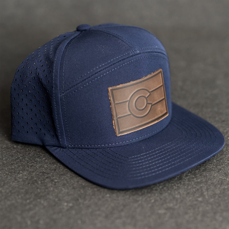 Leather Patch Flat Bill 7 Panel Perforated Performance Hat - Colorado Flag Stamp
