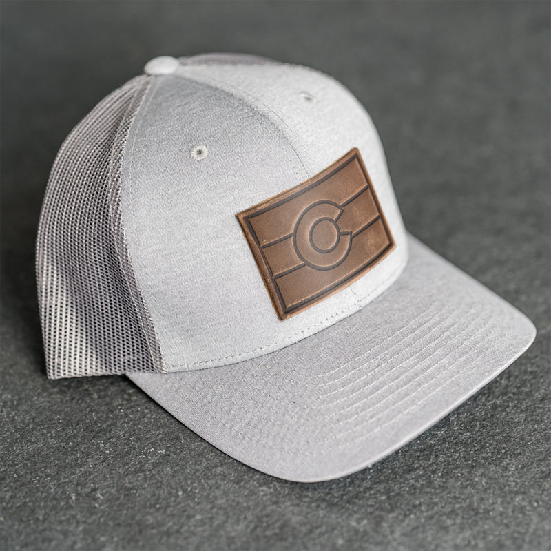 Leather Patch Performance Style Trucker Hat - Colorado Flag Stamp