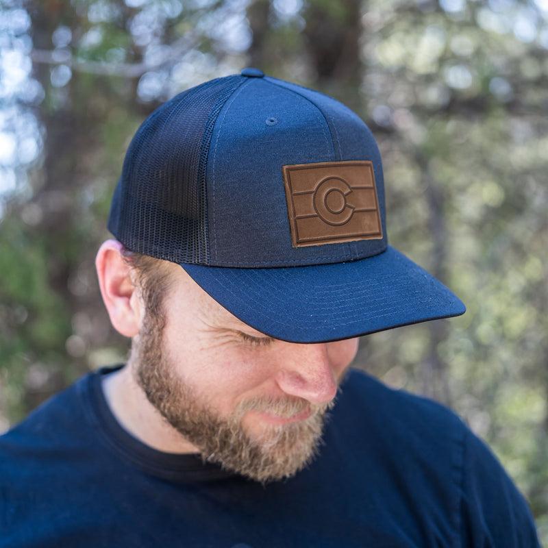 Leather Patch Trucker Style Hat - Colorado Flag Stamp