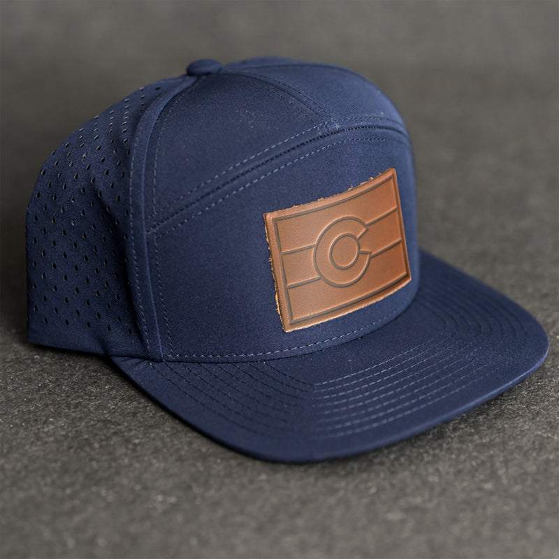 Leather Patch Flat Bill 7 Panel Perforated Performance Hat - Colorado Flag Stamp