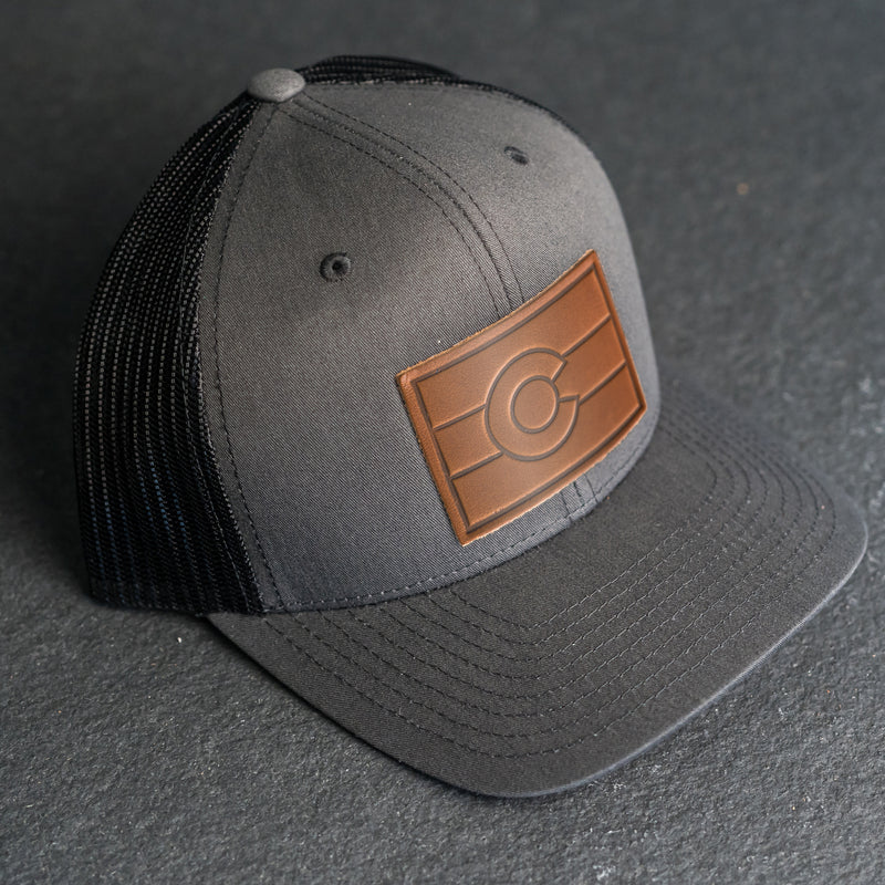 Leather Patch Trucker Style Hat - Colorado Flag Stamp