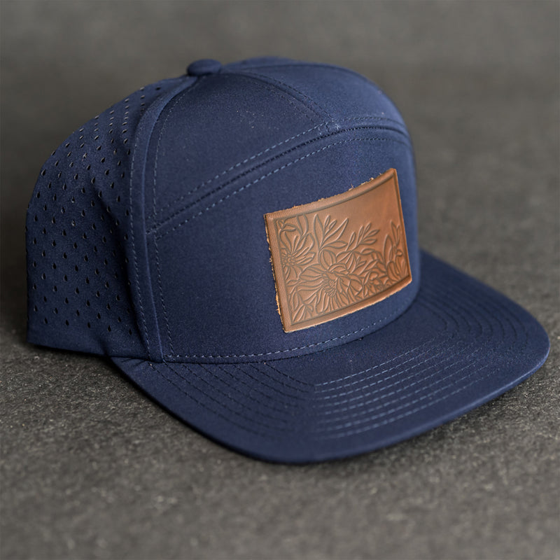 Leather Patch Flat Bill 7 Panel Perforated Performance Hat - Floral Stamp