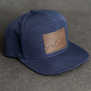 Leather Patch Flat Bill 7 Panel Perforated Performance Hat - Mountains Stamp
