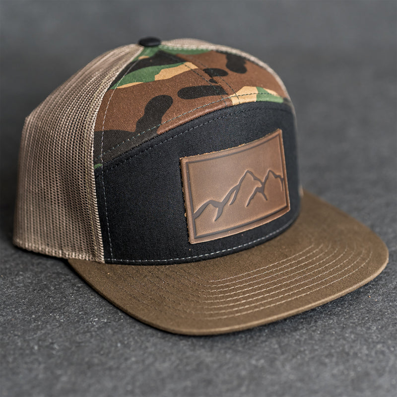 Leather Patch Flat Bill 7 Panel Trucker Hat - Mountains Stamp