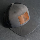 Leather Patch Trucker Style Hat - Idaho Stamp