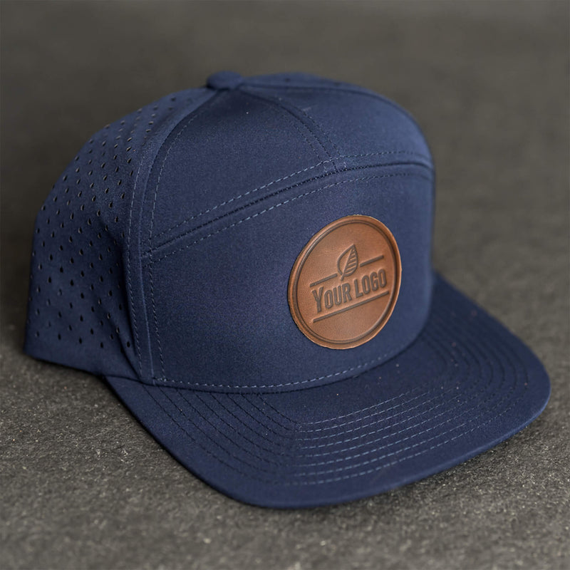 Your Logo on a Leather Patch Flat Bill 7 Panel Perforated Performance Hat - Circle Patch