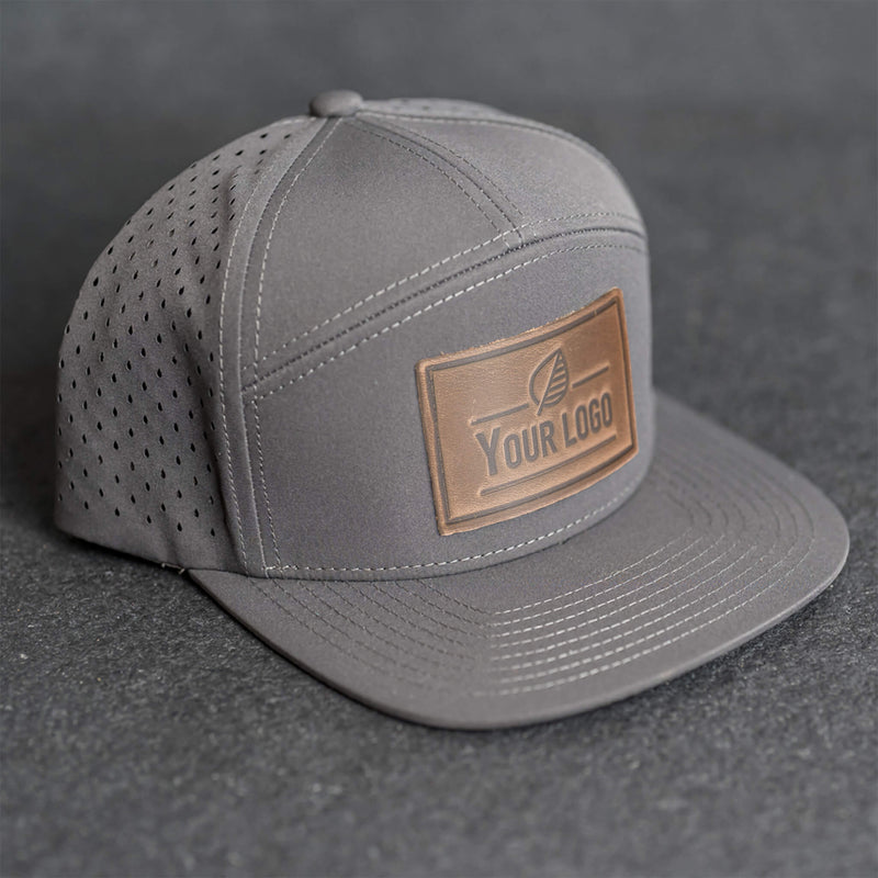 Your Logo on a Leather Patch Flat Bill 7 Panel Perforated Performance Hat
