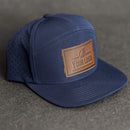Your Logo on a Leather Patch Flat Bill 7 Panel Perforated Performance Hat