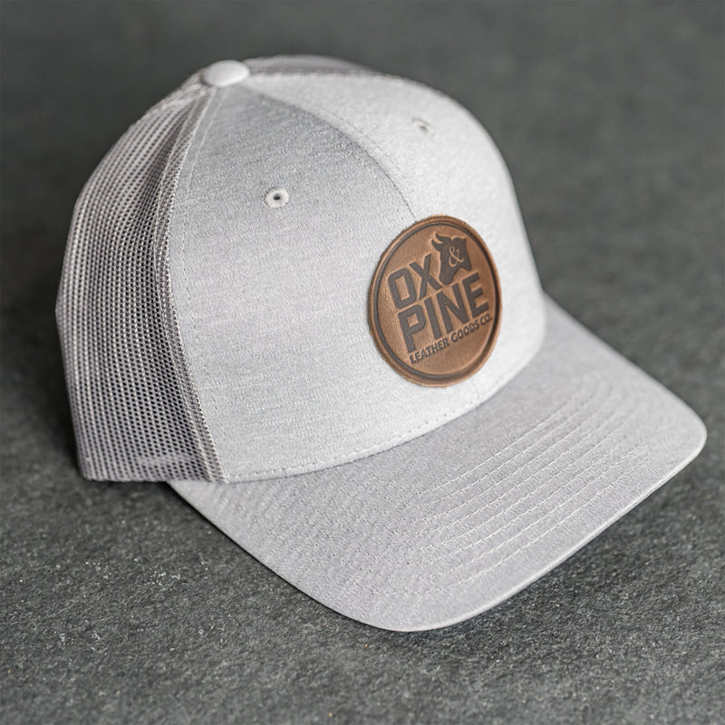 Leather Patch Performance Style Trucker Hat - Ox & Pine Stamp - Circle