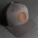 Your Logo on a Leather Patch Trucker Style Hat - Circle Patch