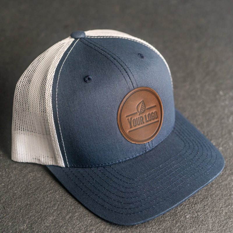 Your Logo on a Leather Patch Trucker Style Hat - Circle Patch
