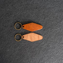 Leather Motel Key Shape Keychain with Wanderlust Stamp Design