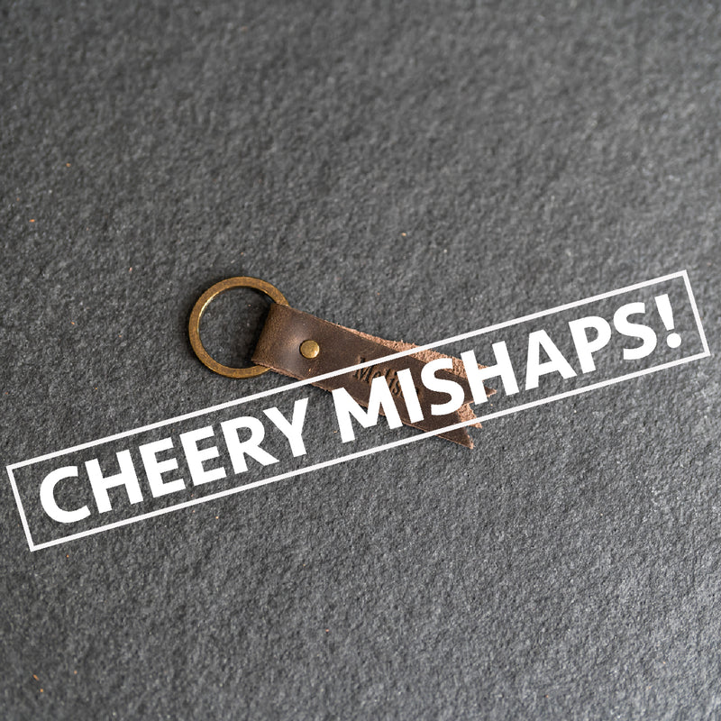 Cheery Mishaps - Flag Shape Leather Keychain