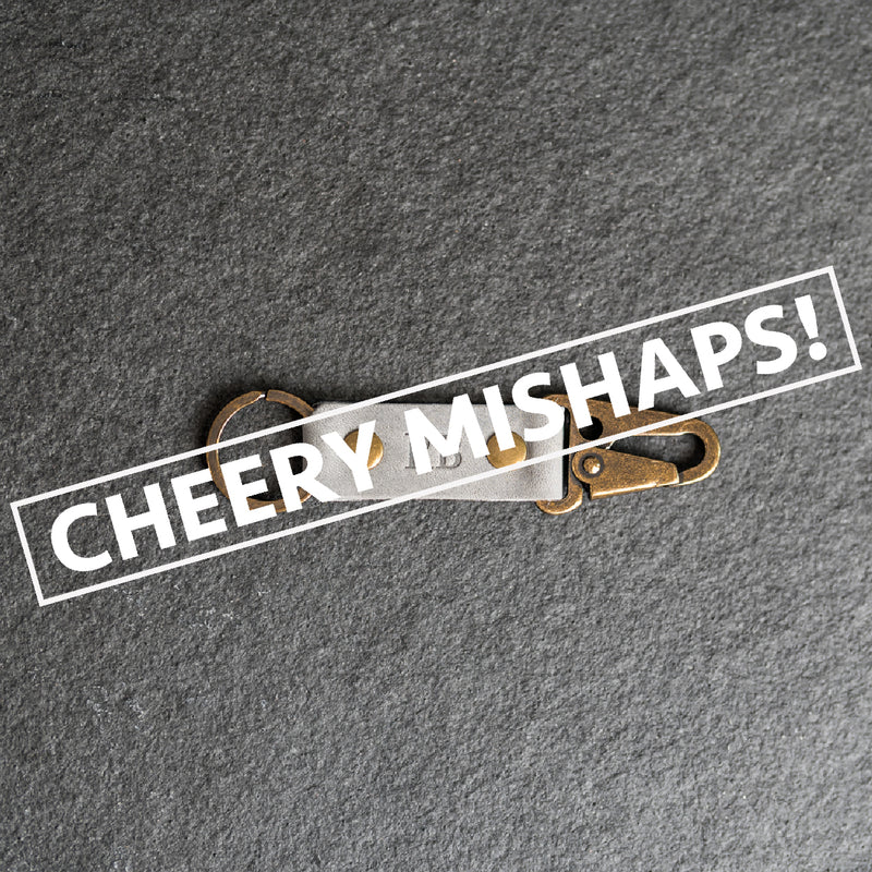 Cheery Mishaps - Push Clip Leather Keychain