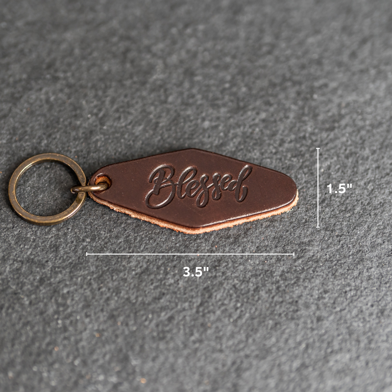 Leather Motel Key Shape Keychain with a Blessed Stamp Design