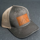 Leather Patch Ponytail Style Hat - Mountain Range Stamp