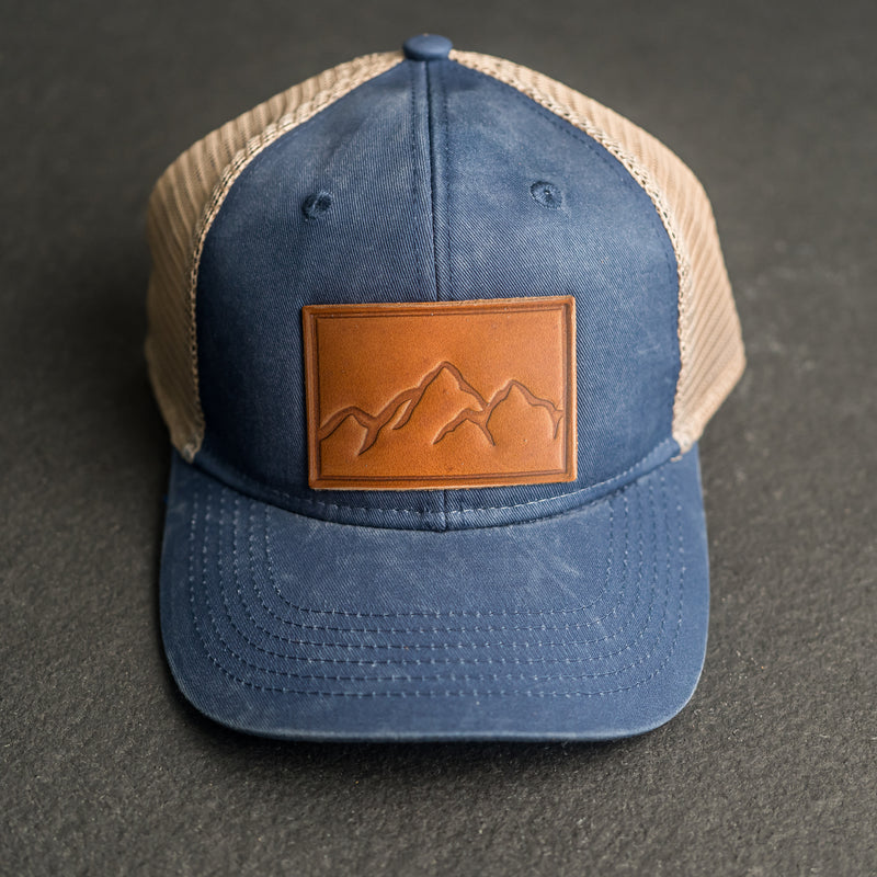 Leather Patch Ponytail Style Hat - Mountain Range Stamp
