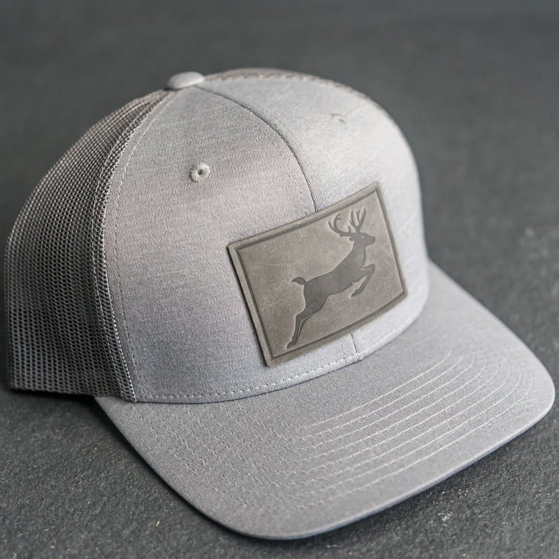 Leather Patch Performance Style Trucker Hat - Deer Stamp