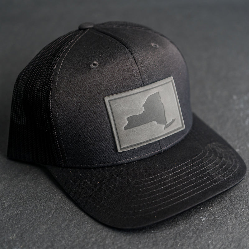 Leather Patch Performance Style Trucker Hat - New York Stamp