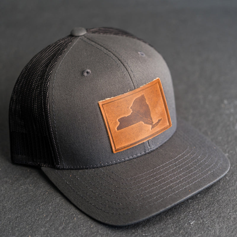 Leather Patch Trucker Style Hat - New York Stamp