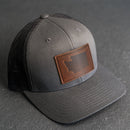 Leather Patch Trucker Style Hat - Washington Stamp