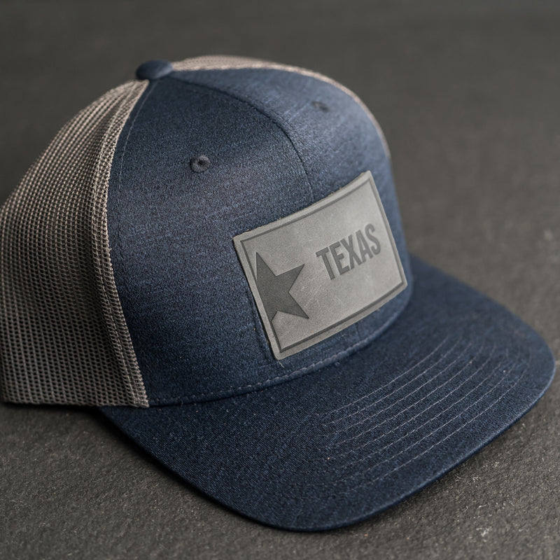 Leather Patch Performance Style Trucker Hat - Texas License Plate Stamp