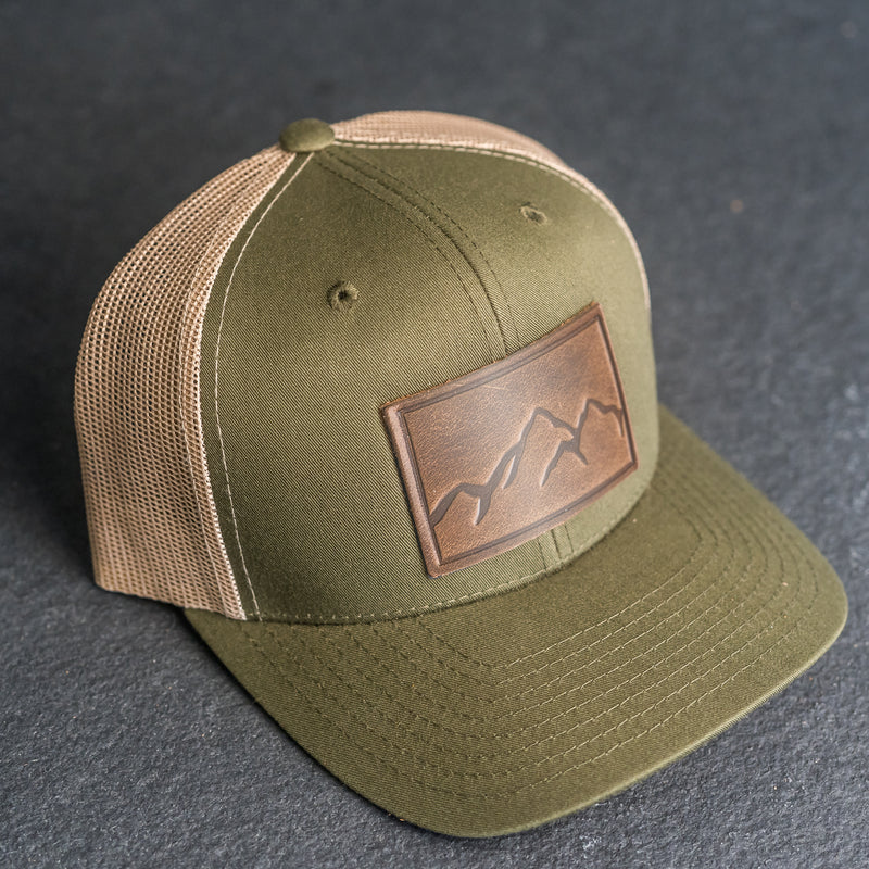 Leather Patch Trucker Style Hat - Mountain Range Stamp