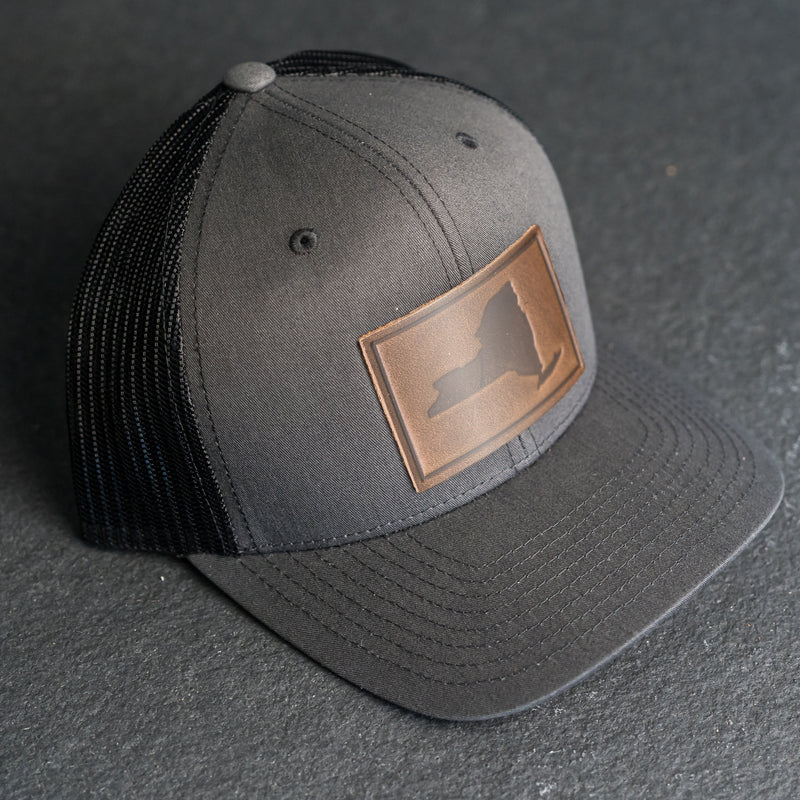 Leather Patch Trucker Style Hat - New York Stamp