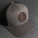 Your Logo on a Leather Patch Trucker Style Hat - Circle Patch