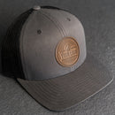 Your Logo on a Leather Patch Trucker Style Hat - Circle Patch
