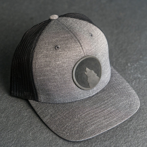 Leather Patch Performance Style Trucker Hat - Wolf Stamp