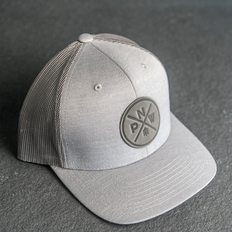 Leather Patch Performance Style Trucker Hat - PNW Stamp