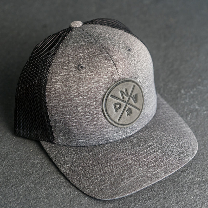 Leather Patch Performance Style Trucker Hat - PNW Stamp